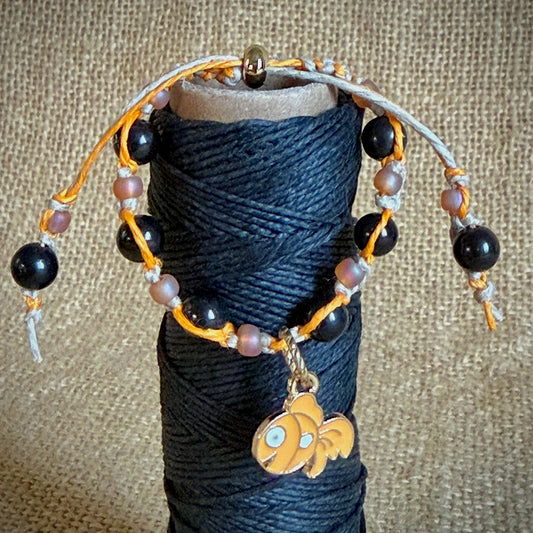 Adjustable Shungite Bracelet for Kids | Goofy Goldfish on spool of black hemp