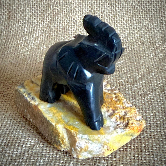 Carved Shungite Elephant | On Bumblebee Jasper Slab