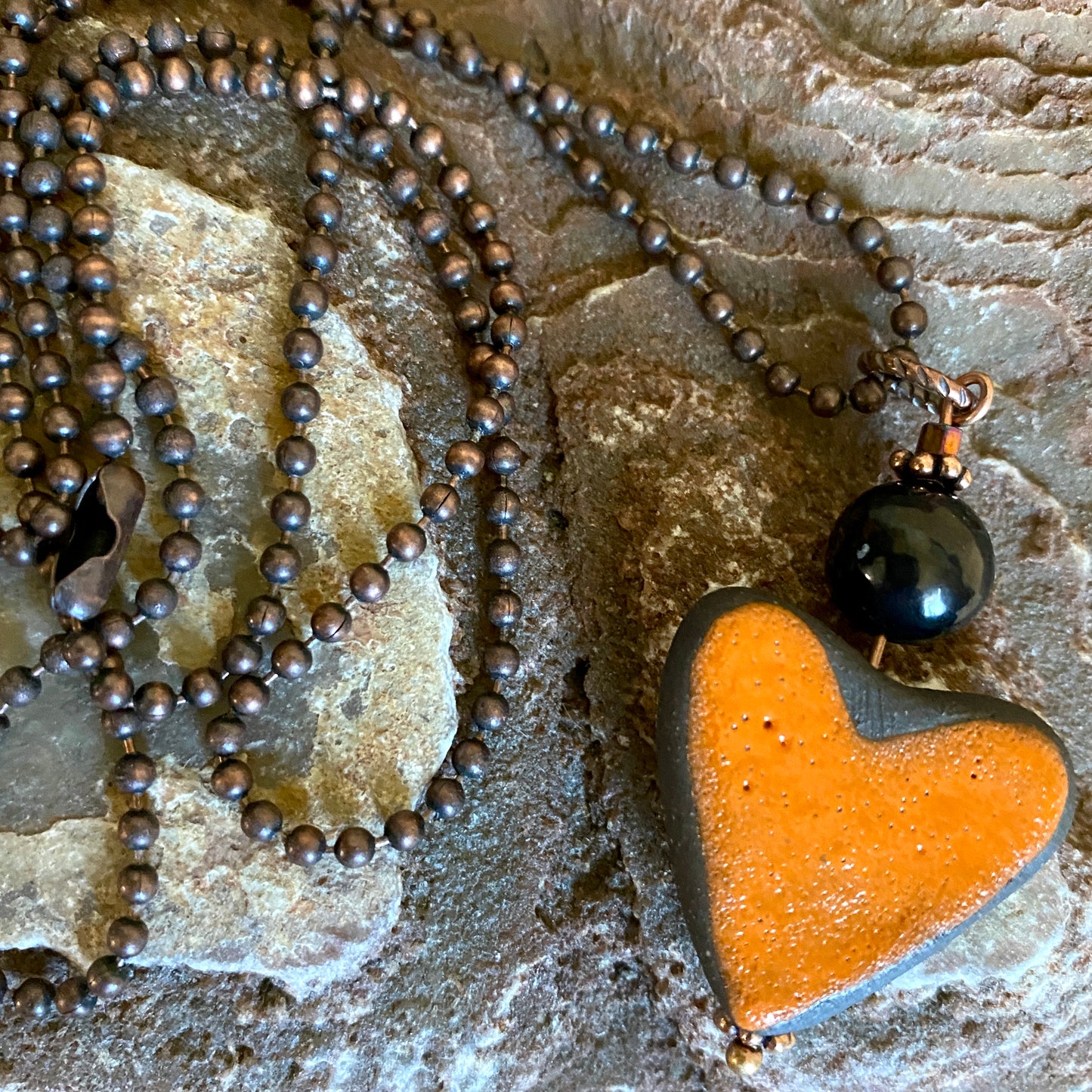 Orange Stoneware Heart Pendant with Shungite Bead on Copper Ball Chain