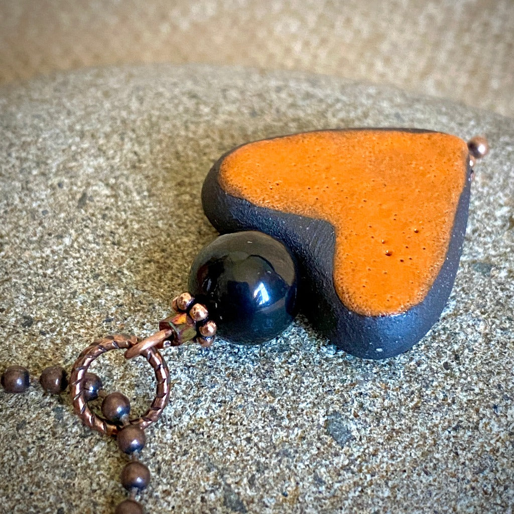 Orange Stoneware Heart Pendant with Shungite Bead on Copper Ball Chain