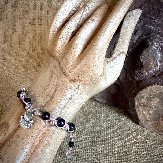 Maneki Neko Shungite Bracelet on wooden arm