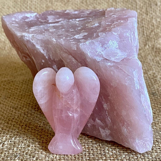 Rose Quartz Angel on Raw Rose Quartz River Tumbled Shungite Stack