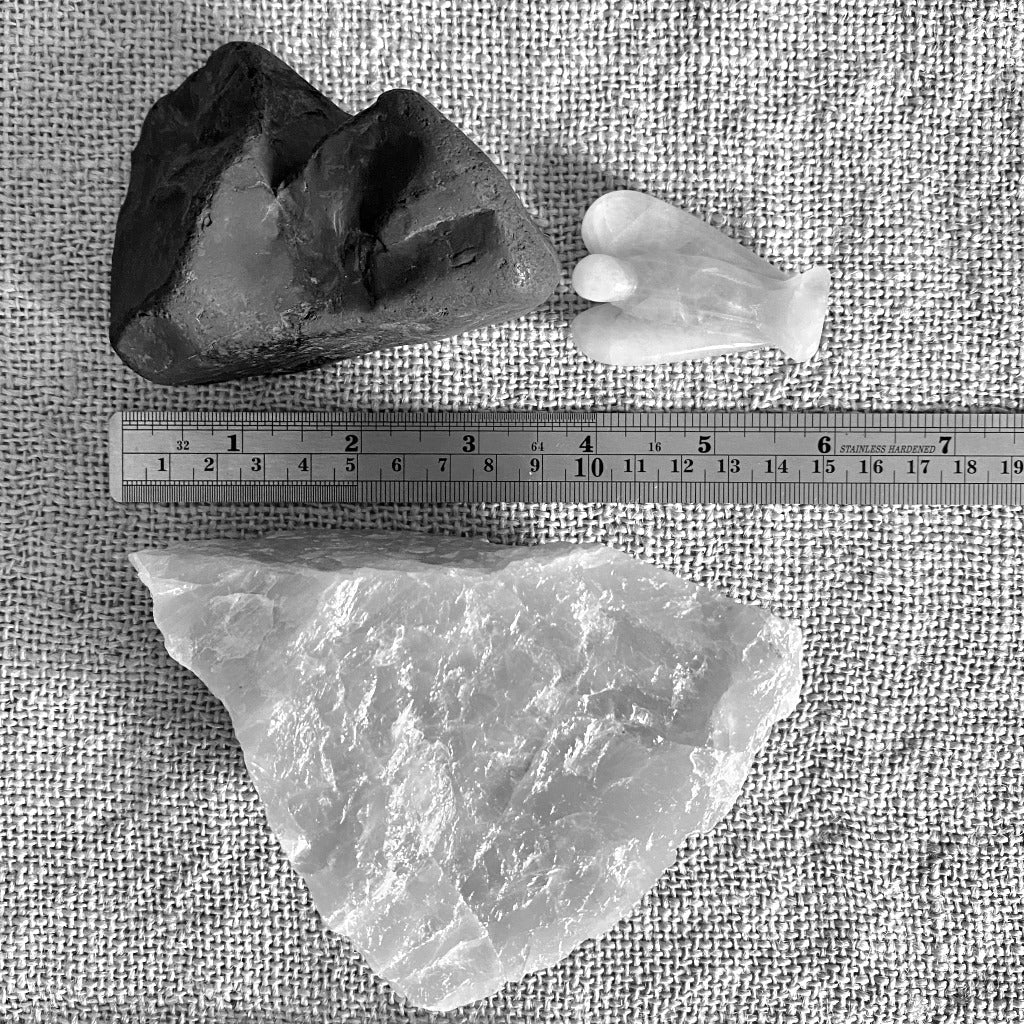 Rose Quartz Angel on Raw Rose Quartz River Tumbled Shungite Stack