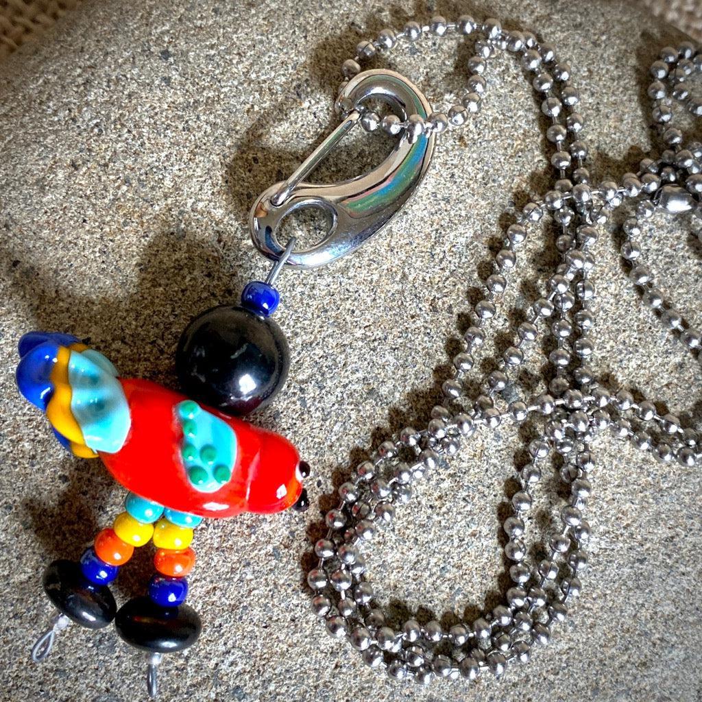 Colorful Shungite Bird Clip-on, Red and Blue, Artisan Lampwork Glass