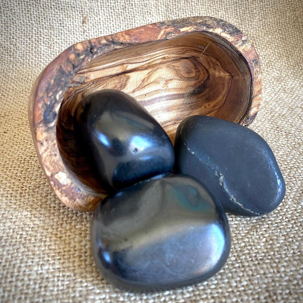 Tumbled Jumbo Shungite Stone Trio in Mediterranean Olive Wood Bowl