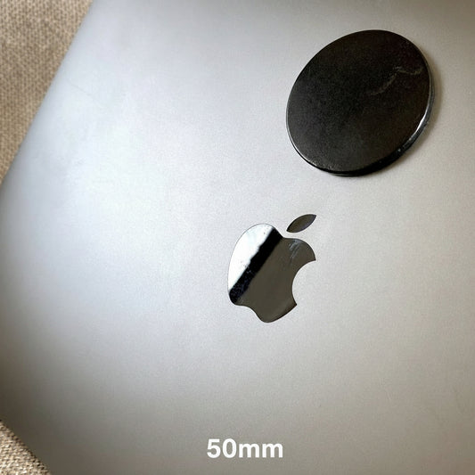 Round Black Shungite Phone Plates with Adhesive on Back 50mm on computer
