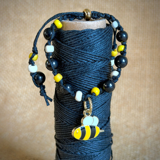 Adjustable Shungite Bracelet for Kids | Bizzy Bumblebee on spool of black hemp cording