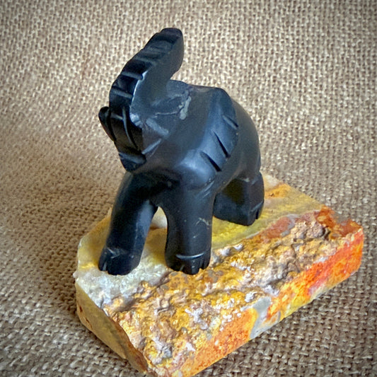 Carved Shungite Elephant | On Bumblebee Jasper Slab