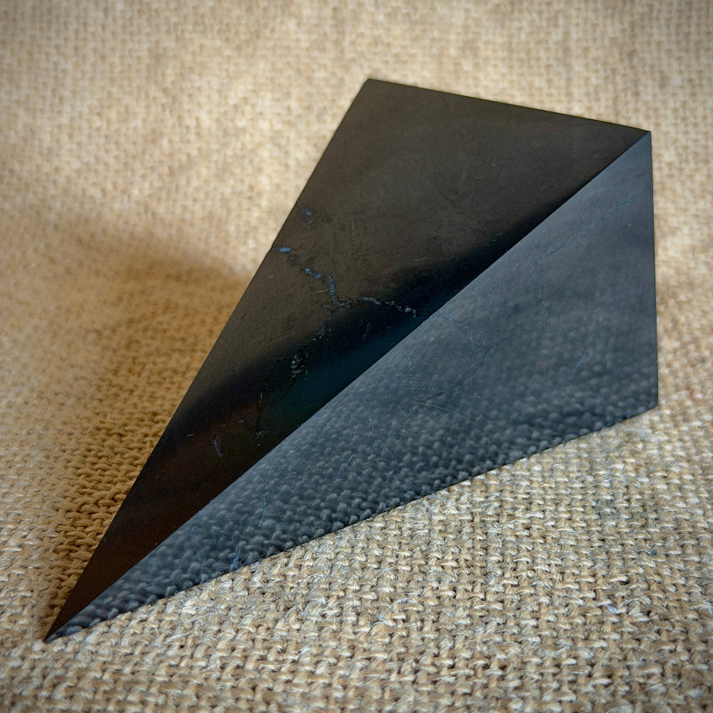 High Shungite Pyramid, 50mm Square Base | Olive Wood Stand 1