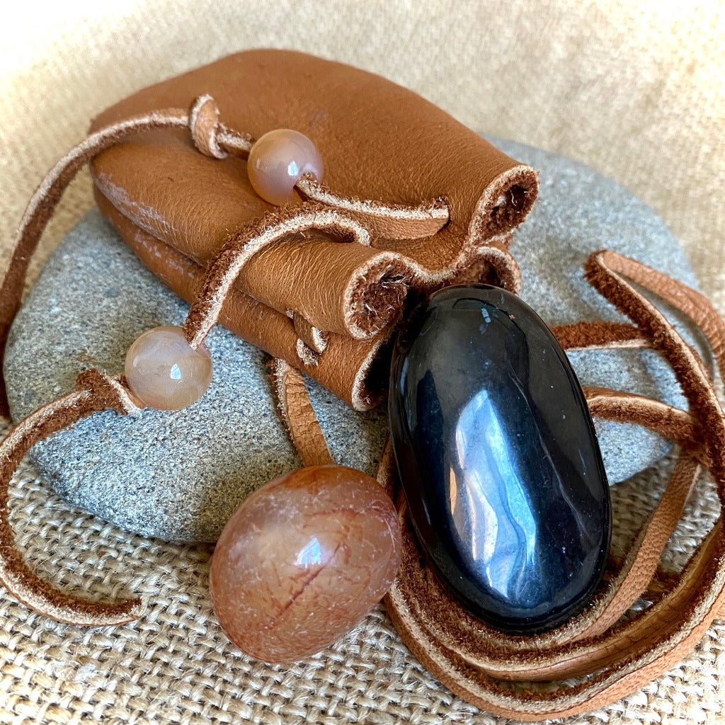 Shungite Palm Stone with Carnelian in Elk Leather Neck Pouch