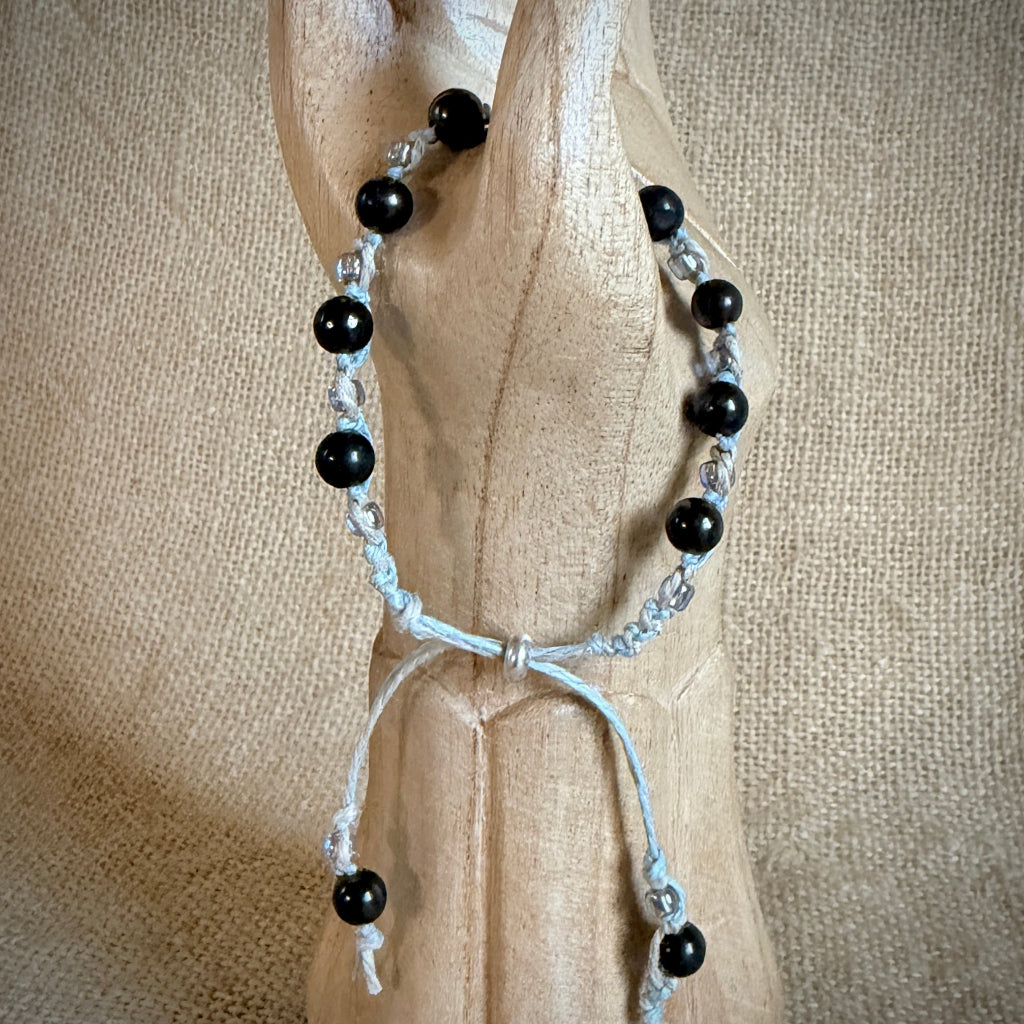 Light Blue Beaded Hemp & Linen Bracelet | Hint of Silver Sparkle draped over wooden arm