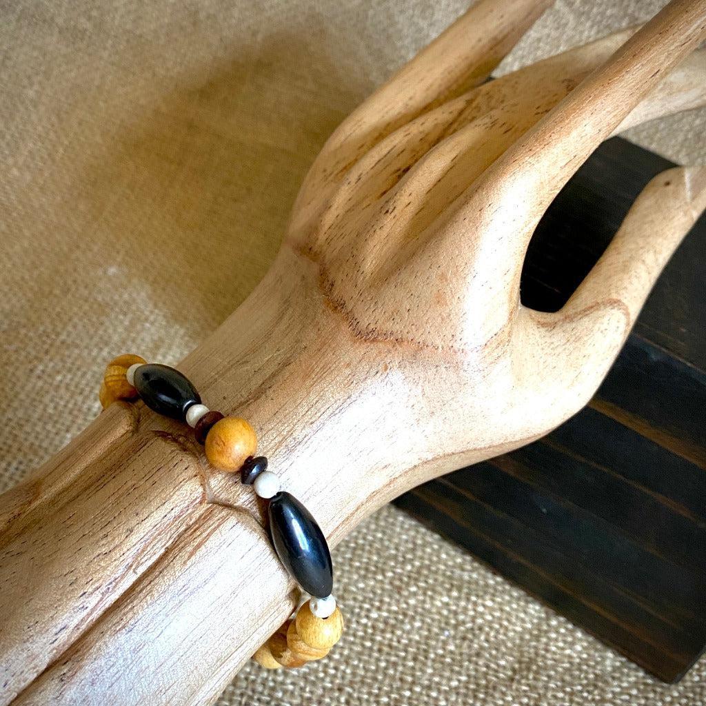 Palo Santo Bracelet, Shungite Torpedo, White Fossil, Red Hairpipe