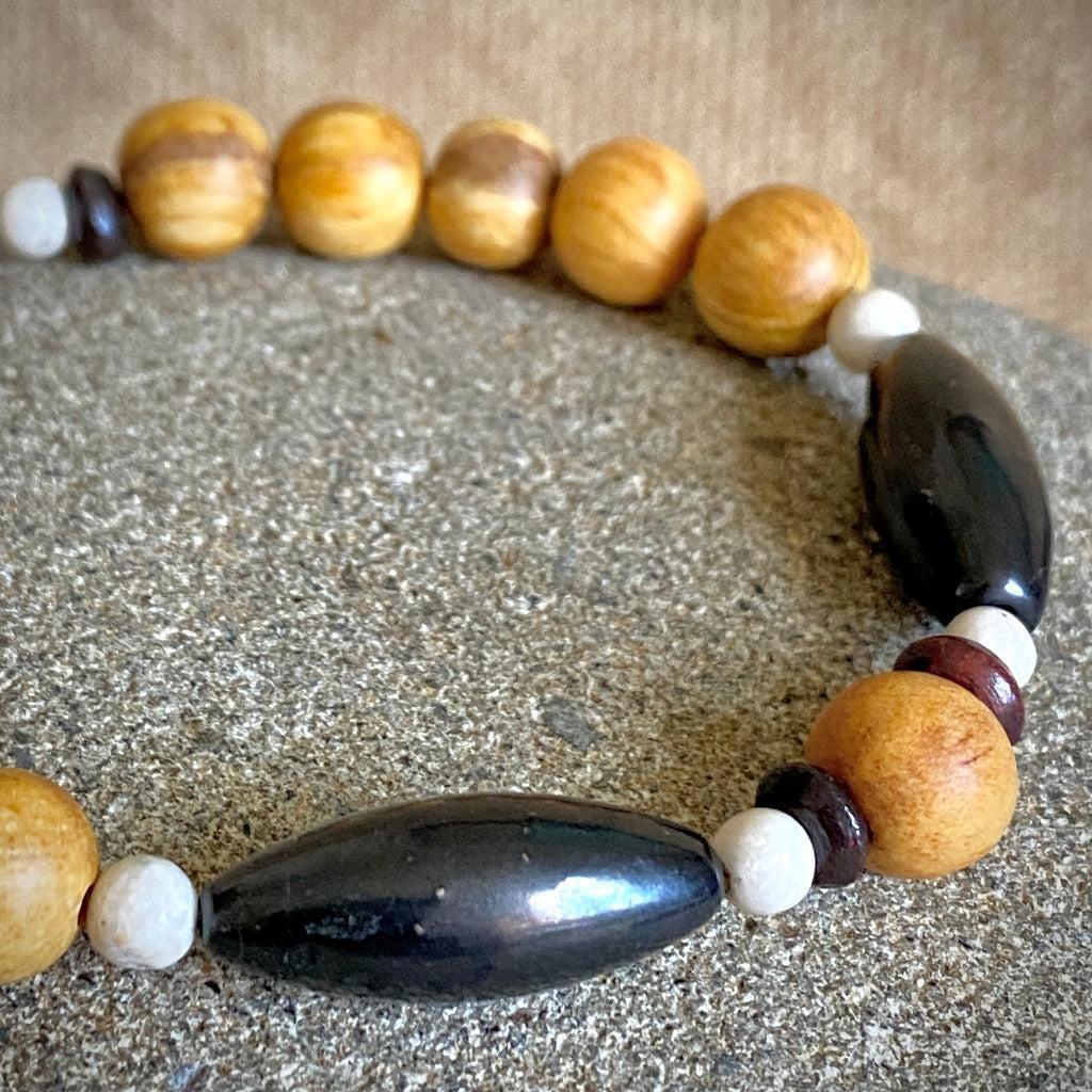 Palo Santo Bracelet, Shungite Torpedo, White Fossil, Red Hairpipe