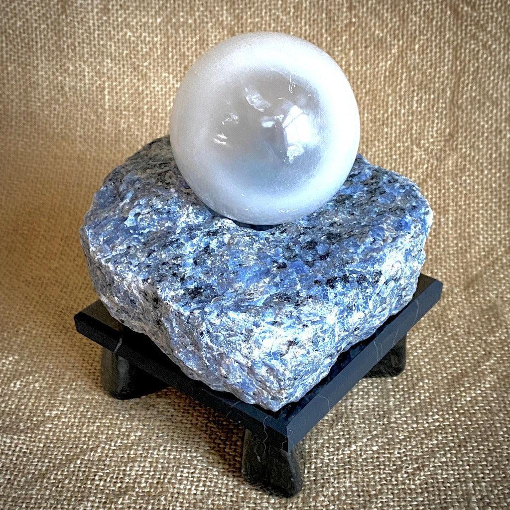 Selenite Sphere & Rough Sodalite Block on Polished Black Shungite Stand