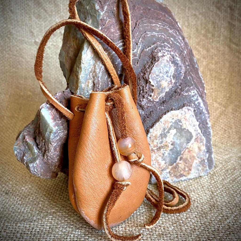 Shungite Palm Stone with Carnelian in Elk Leather Neck Pouch