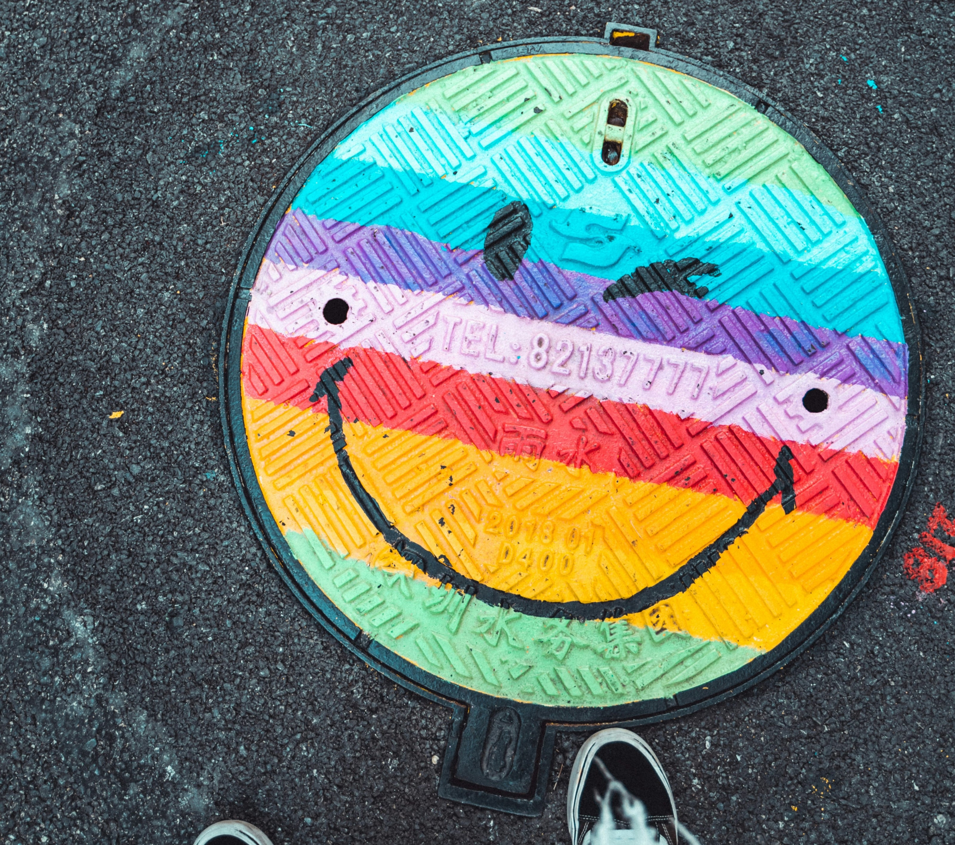 Smiley Face Sewer Cover