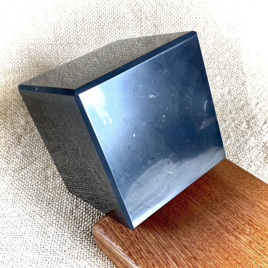 Polished Shungite Cube, 4 Inch (100 mm), with Custom Mahogany Stand - Shungite Queen