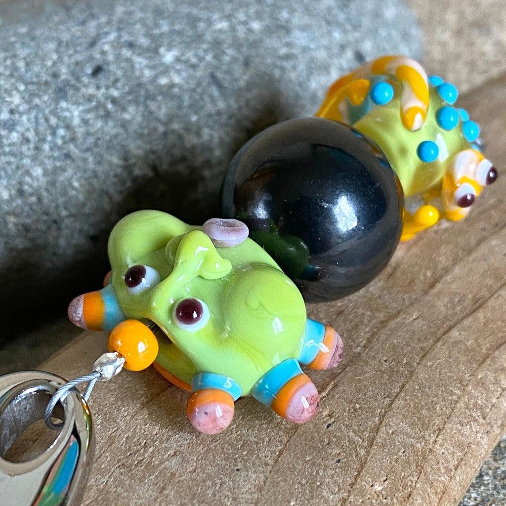 Shungite Clip-on, Necklace, Whimsical Lime Green Sun Face, Lampwork Glass